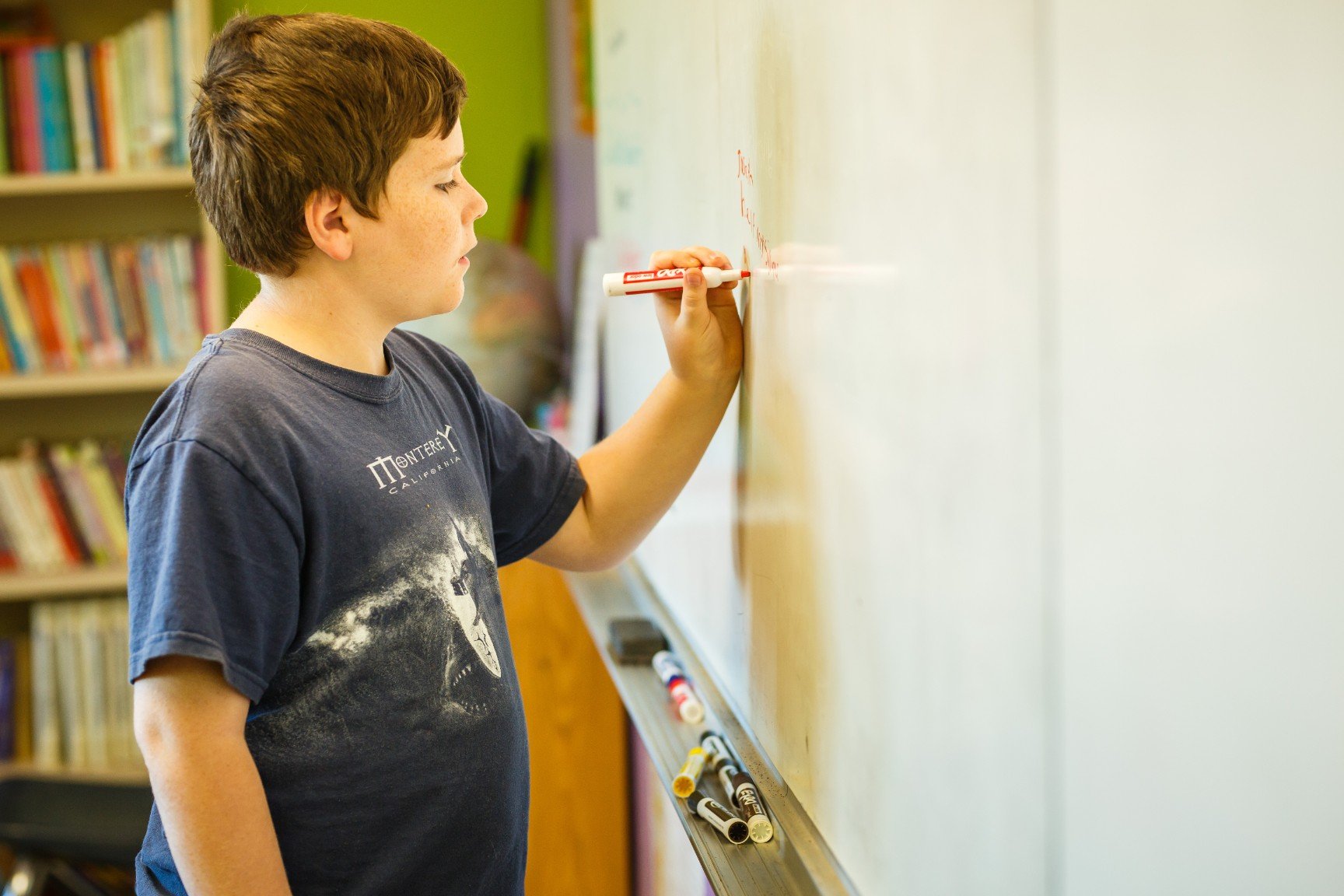 Boy at the chalkboard 
