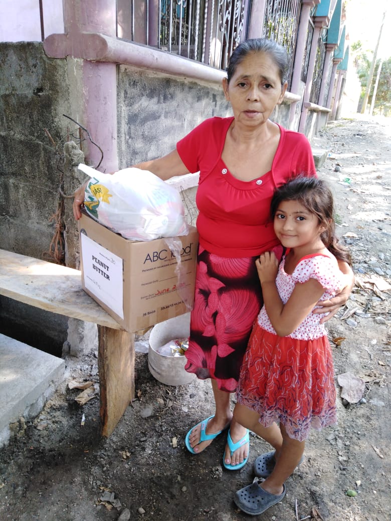 Woman and Child receiving food