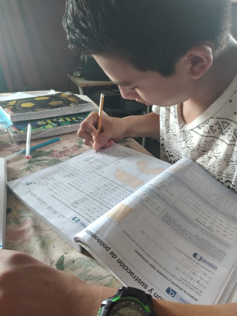 Photo of child doing school online
