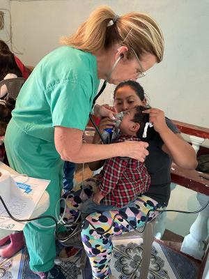 Lisa Kaylor works with a patient